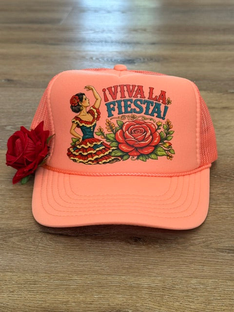 Viva La Fiesta trucker hat in coral with floral fiesta graphic with red flower accent
