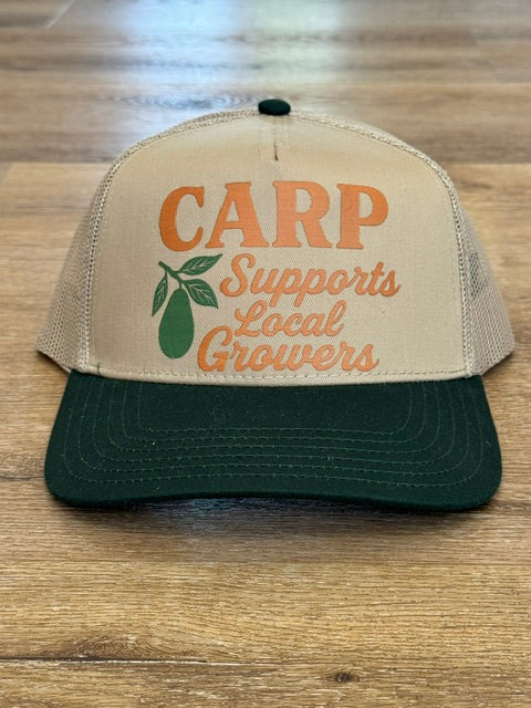 CARP Supports Local Growers trucker hat in beige and forest green with orange lettering and avocado motif