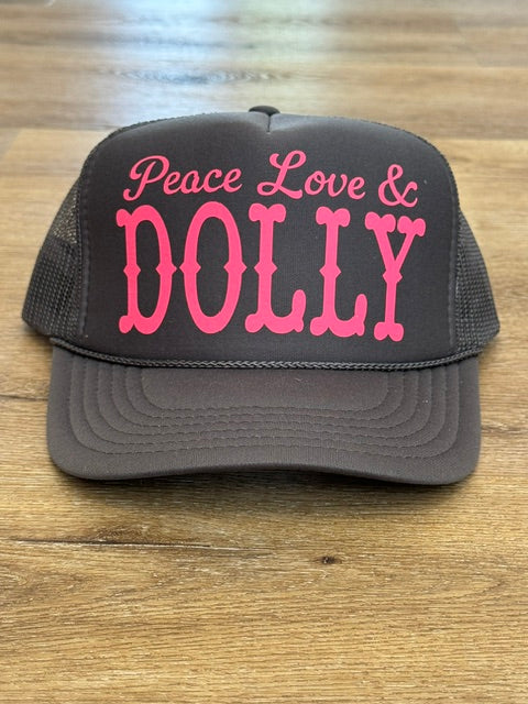 Peace Love and Dolly trucker hat in charcoal with pink lettering