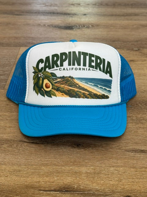 Carpinteria Landscape trucker hat in bright blue and white with coastal landscape patch
