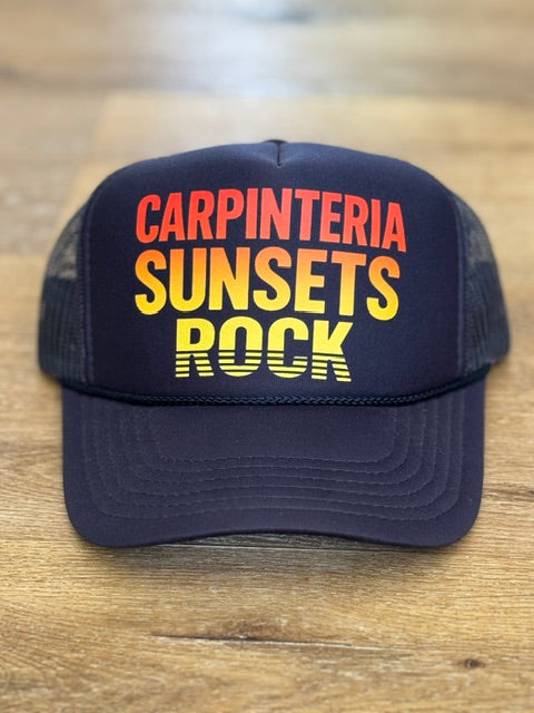 Carpinteria Sunsets Rock trucker hat in navy with orange and yellow lettering
