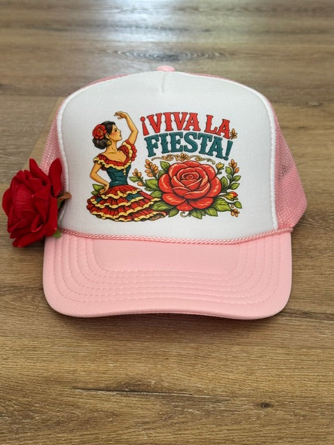 Viva La Fiesta trucker hat in pink and white with floral fiesta graphic with red flower accent