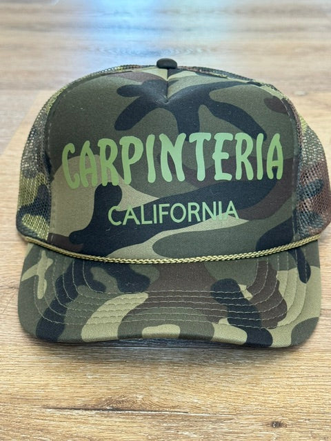 Carpinteria California trucker hat in camouflage with green lettering