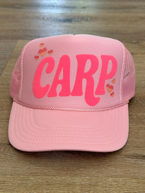 Classic CARP trucker hat in pink with coral lettering with small decorative accents