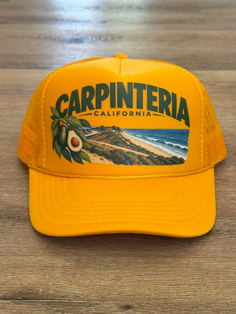 Carpinteria Landscape trucker hat in golden yellow with coastal landscape patch