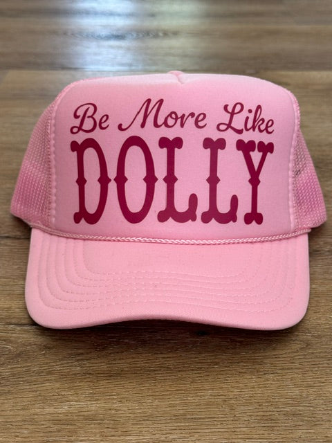 Be More Like Dolly trucker hat in pink with burgundy lettering